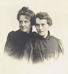 Two women posing intimately